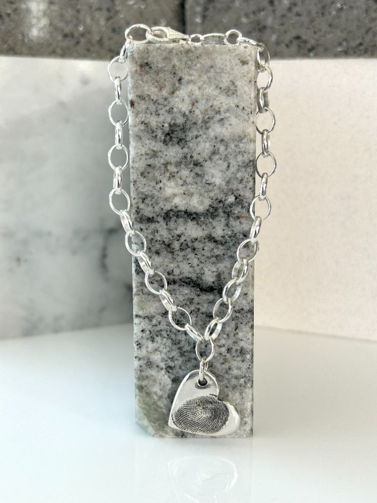 Sterling silver heart hot sale locket bracelet